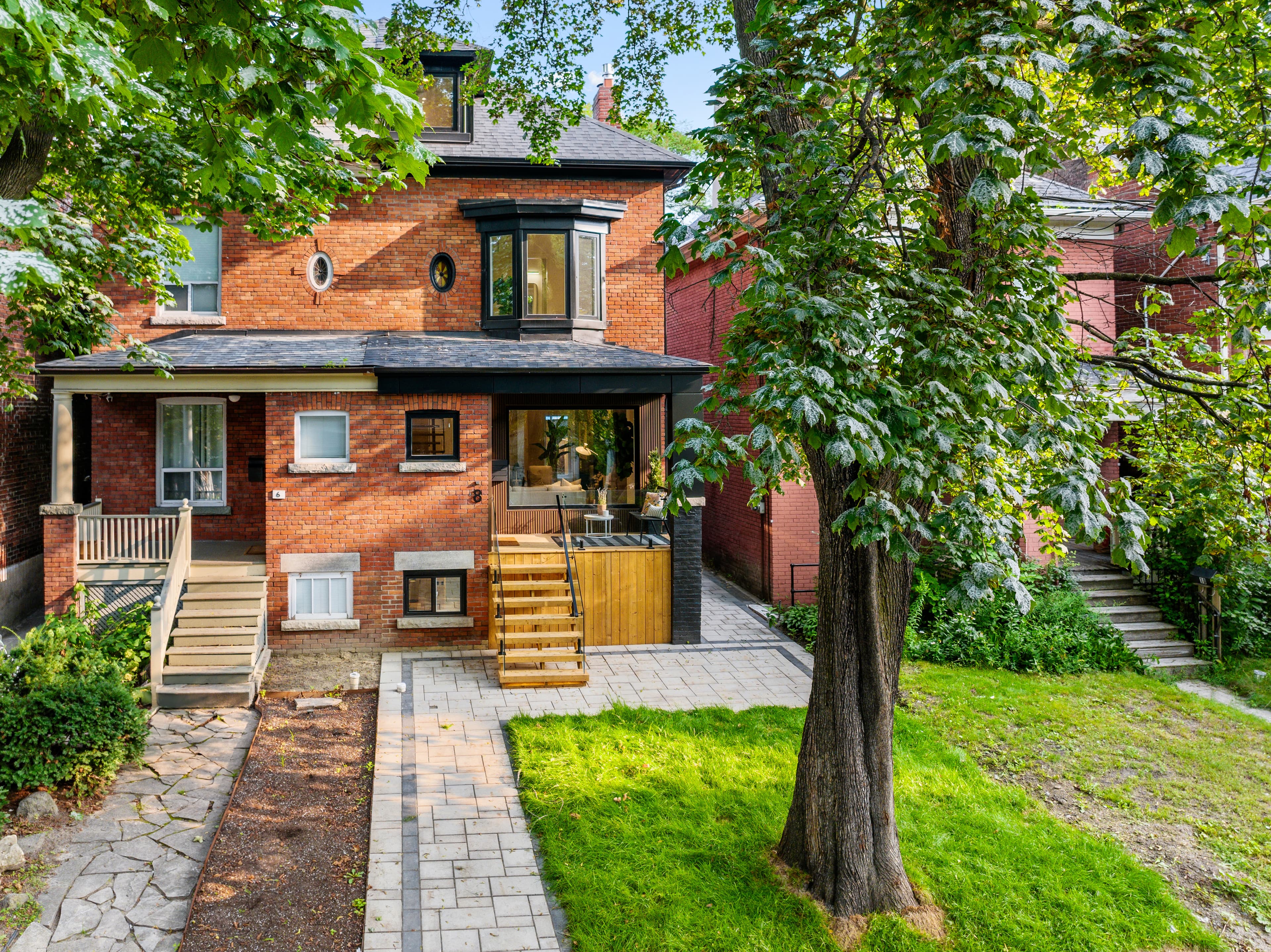 Cozy garden suite exterior with greenery